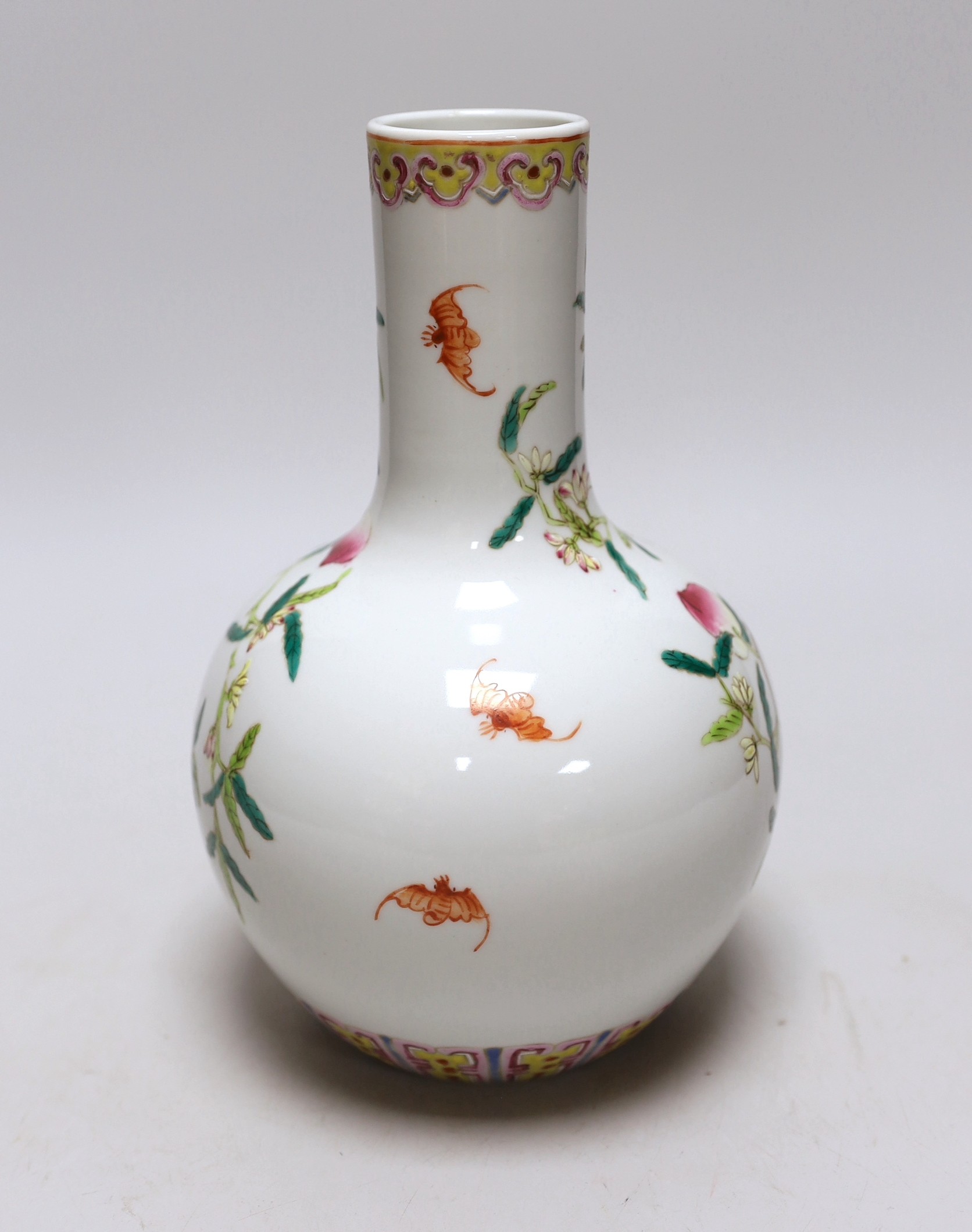 A small Chinese peach decorated bottle vase, 23cm high